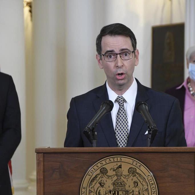 FBI raids home of ex-Maryland official as manhunt continues